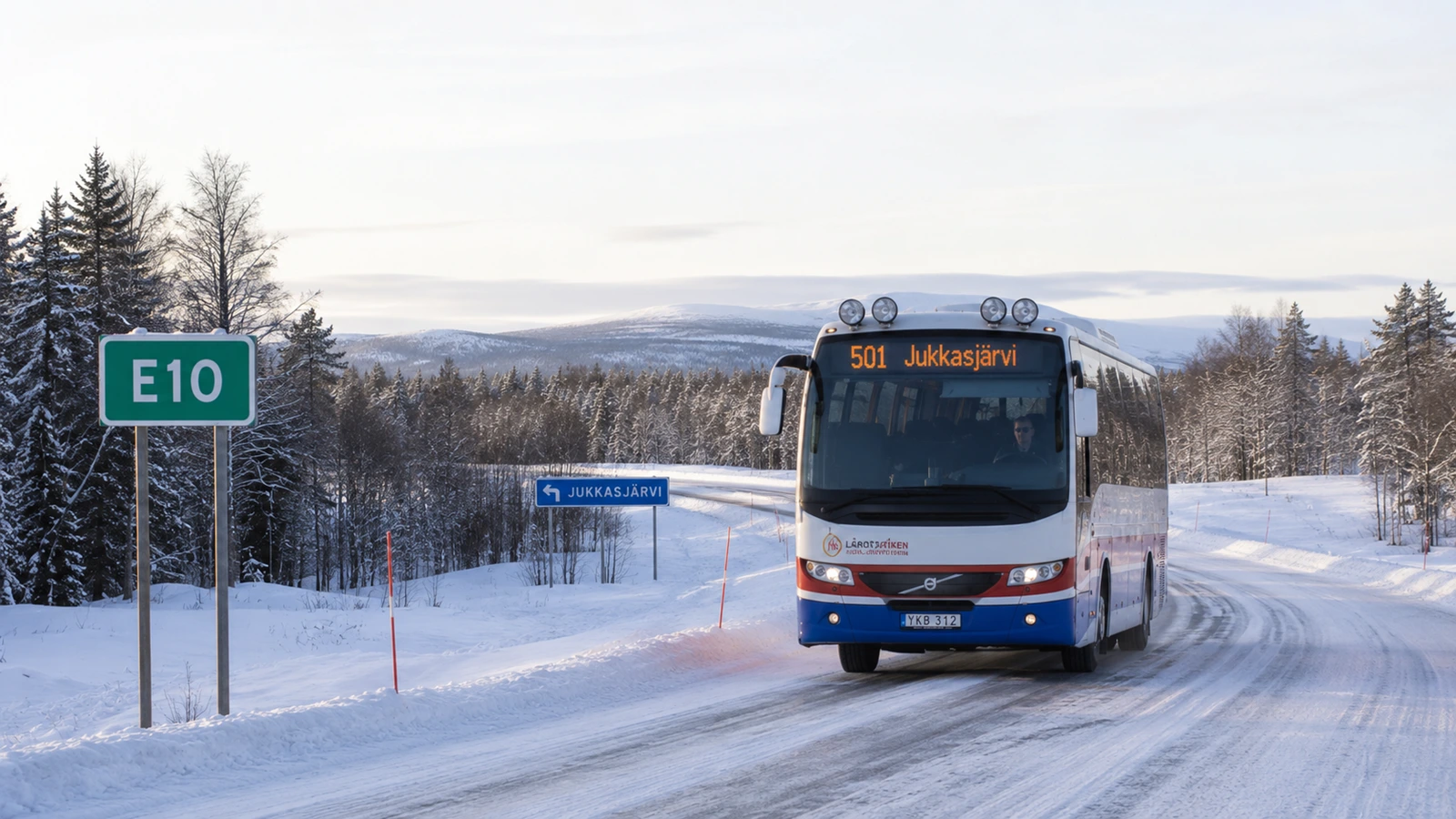 Bus 501 traveling between Kiruna and Jukkasjärvi in winter