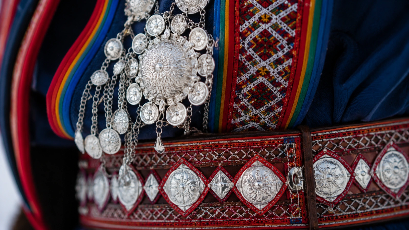 Traditional Sámi patterns and silver jewelry details